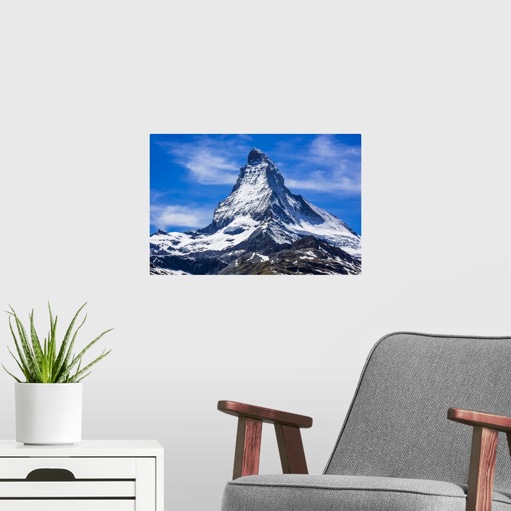 A modern room featuring The snow coverd Matterhorn mountain on a sunny day at Zermatt, Switzerland