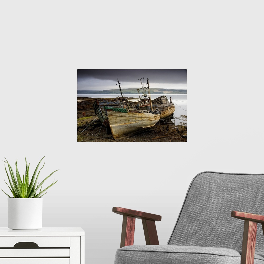 A modern room featuring Three Boats On Shore, Scotland