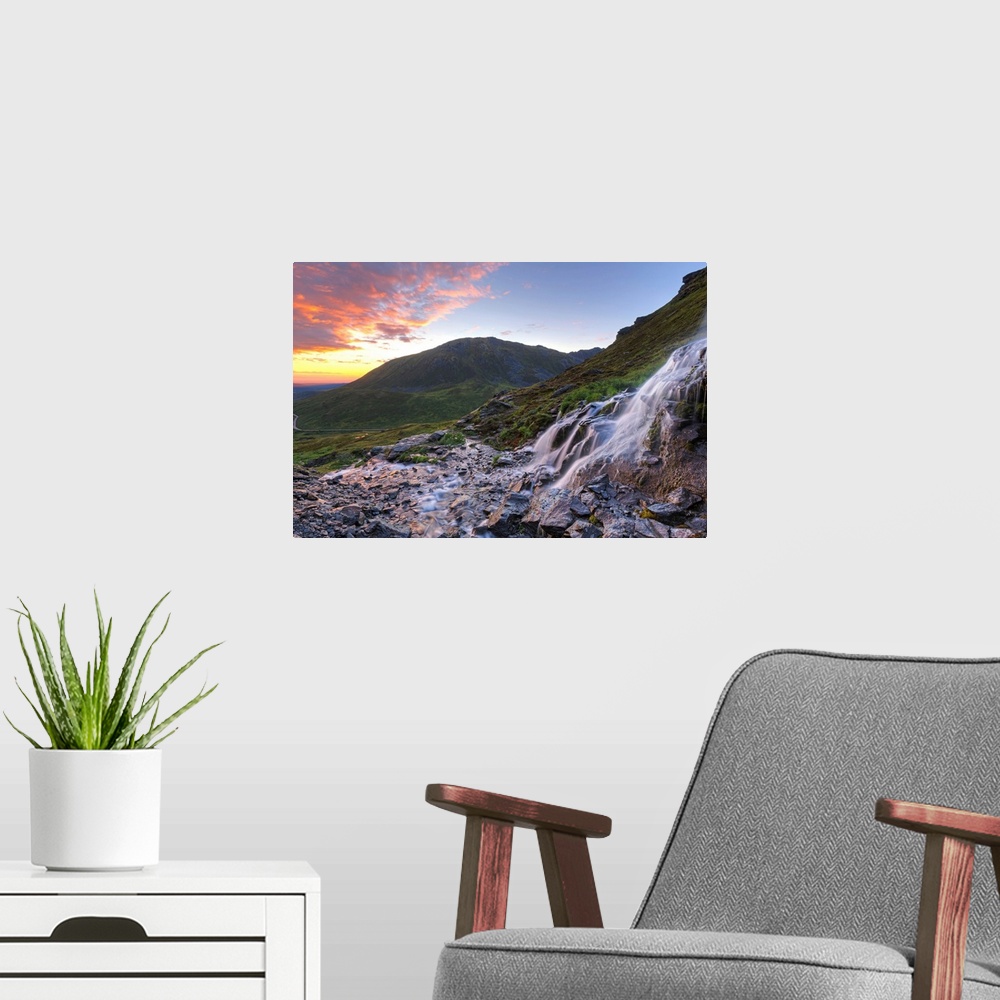 A modern room featuring Scenic sunset view of a waterfall at Summit Lake State Recreation Site, Hatcher Pass, Alaska.