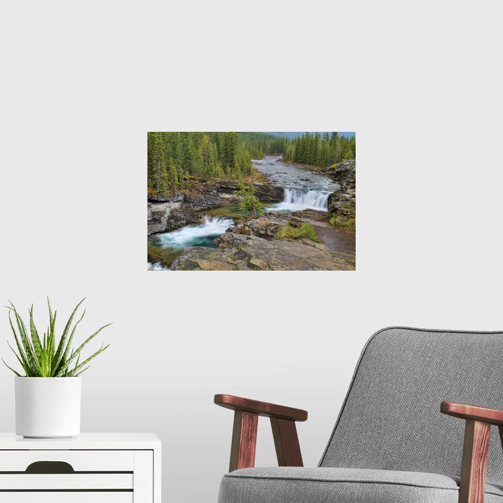 A modern room featuring Waterfall In The Canadian Rocky Mountains; Kananaskis, Alberta, Canada