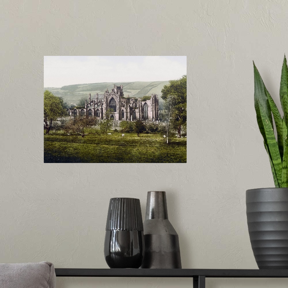 A modern room featuring Melrose Abbey