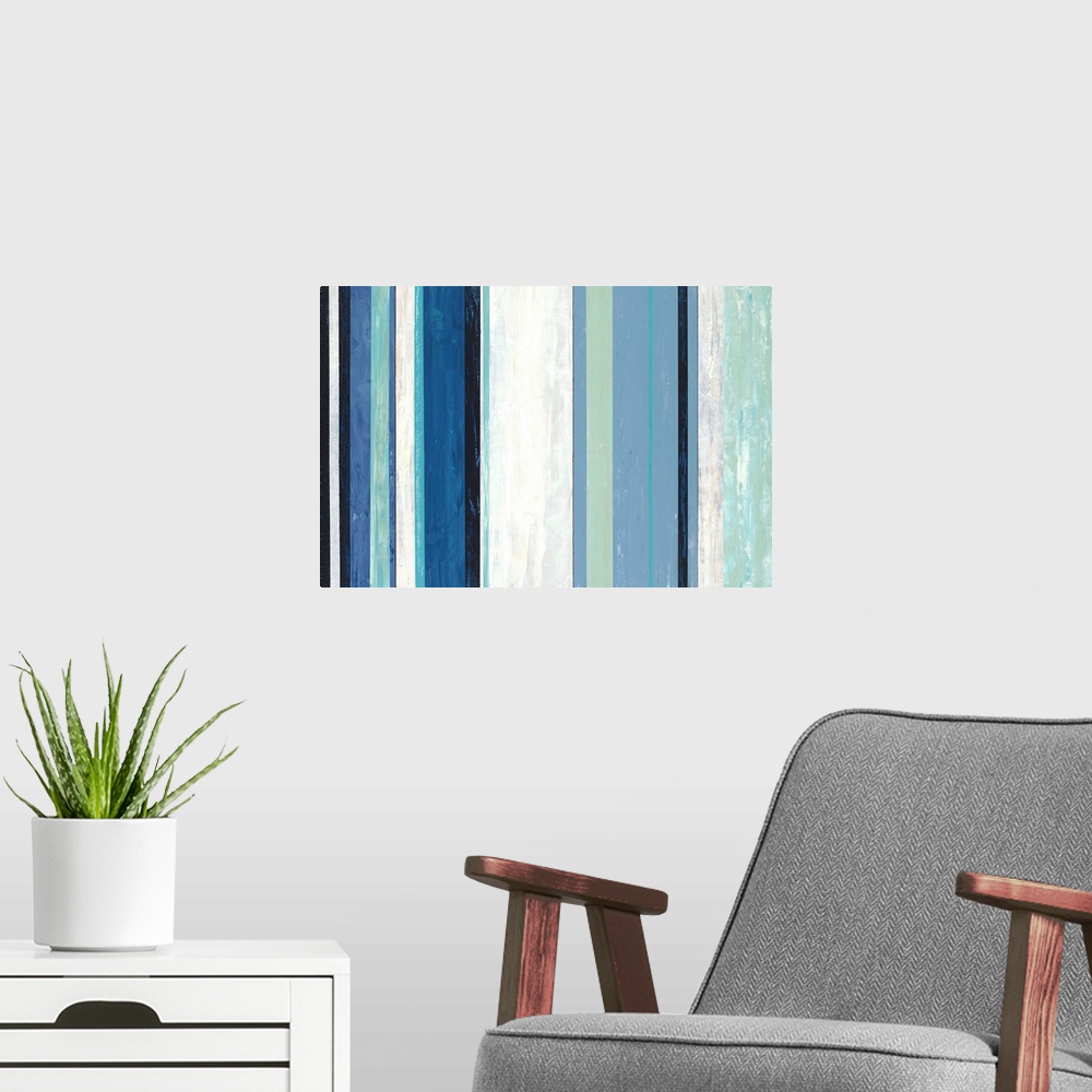 A modern room featuring Contemporary abstract home decor artwork using cool tones.