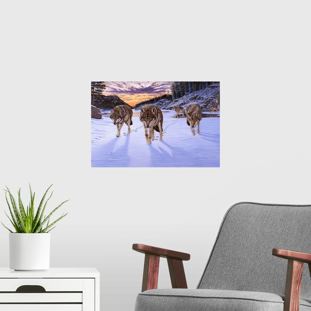 A modern room featuring Contemporary artwork of a pack of wolves in wintry scene at sunset.