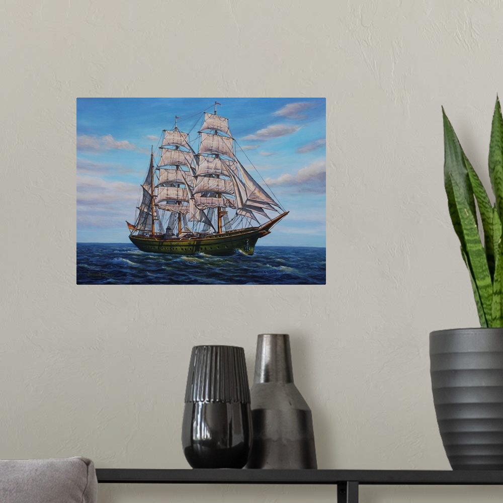 A modern room featuring Contemporary artwork of a large ship with several sails on the ocean.