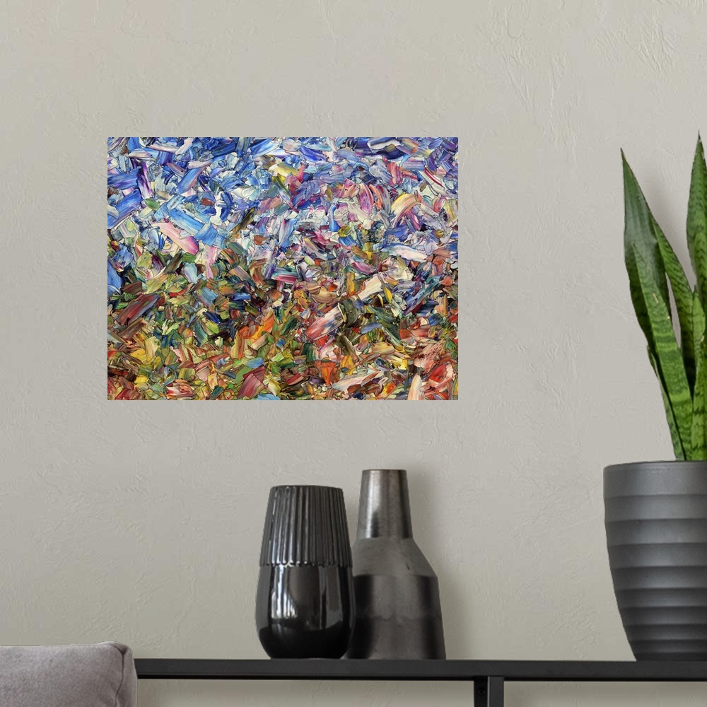 A modern room featuring Abstract artwork made of streaks and splatters, resembling flowers in a garden.