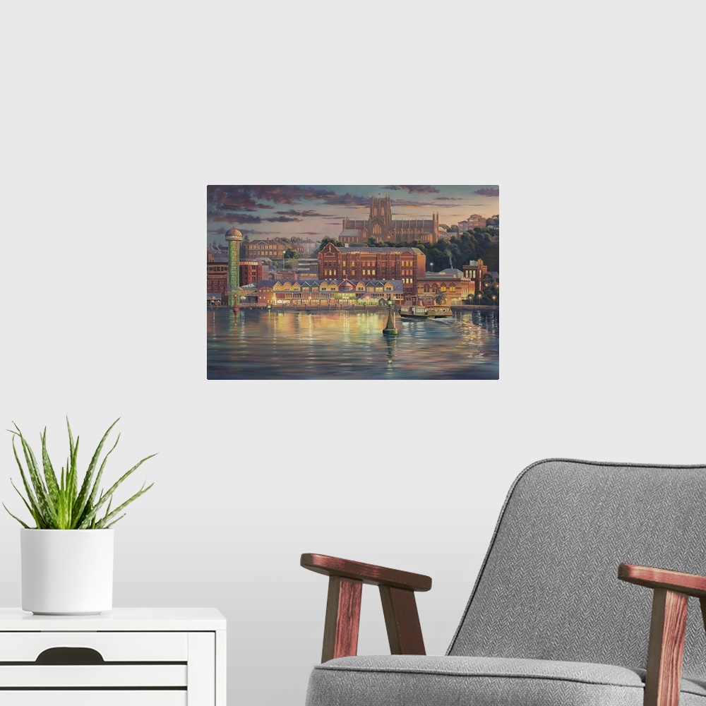 A modern room featuring Contemporary painting of town lit up at night.