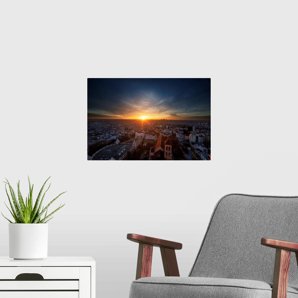 A modern room featuring A photograph of Paris at Sunset.