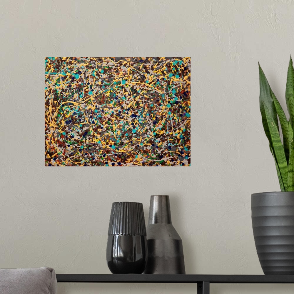 A modern room featuring Contemporary abstract painting made of paint splatters and swirls.