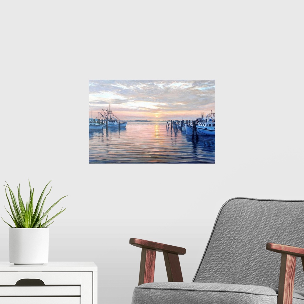 A modern room featuring Contemporary artwork of a harbor full of docked boats at sunset.