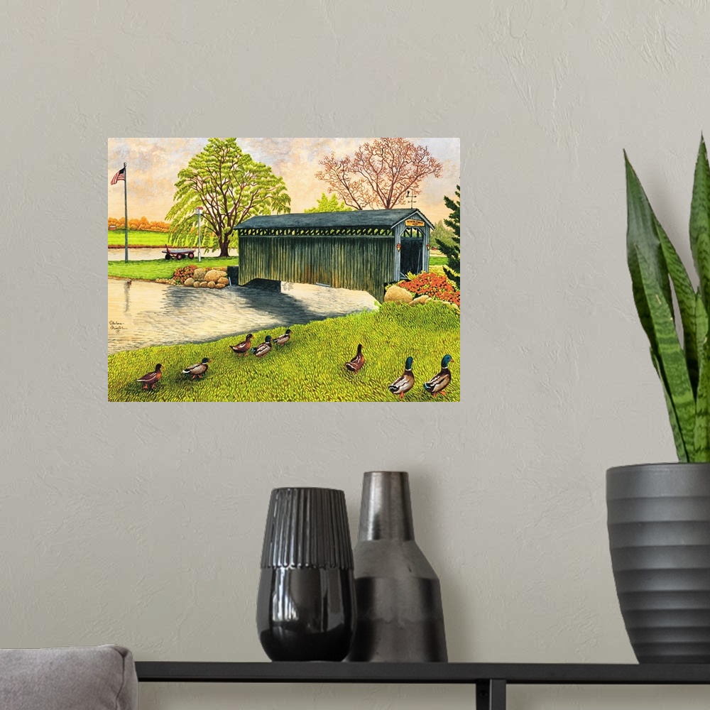 A modern room featuring Contemporary artwork of a covered bridge spanning a small river New York.