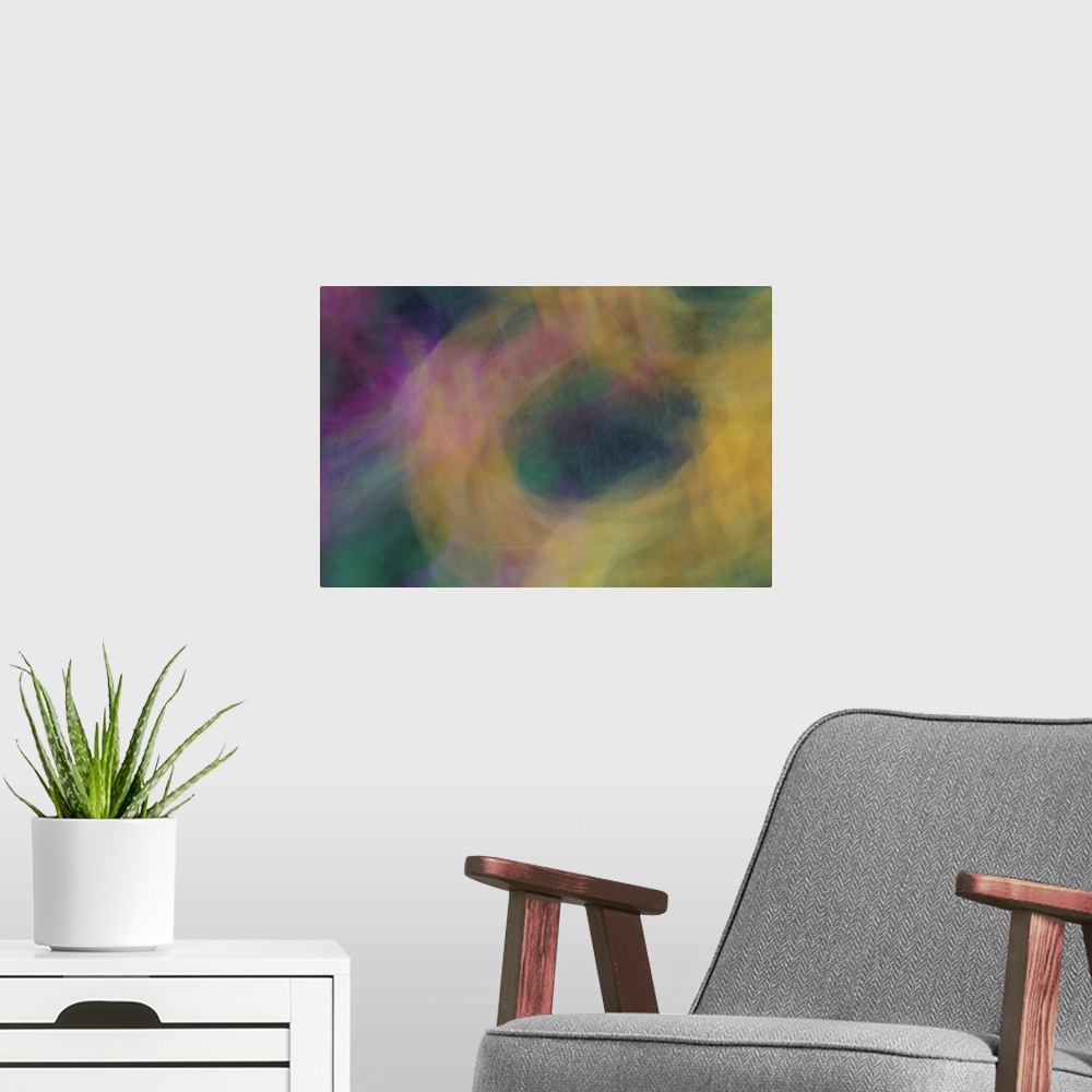 A modern room featuring Impressionist photograph that captures the essence of a flower garden.