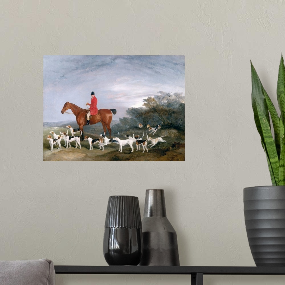 A modern room featuring Oil painting of hunter on horseback surrounded by several hunting dogs.