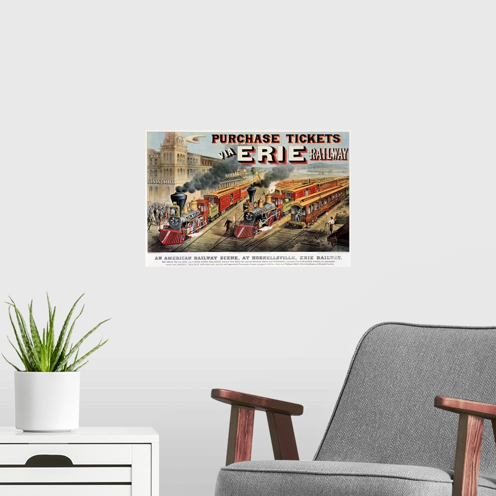 A modern room featuring Vintage poster of two trains pulling out of the station which is viewed to the left.