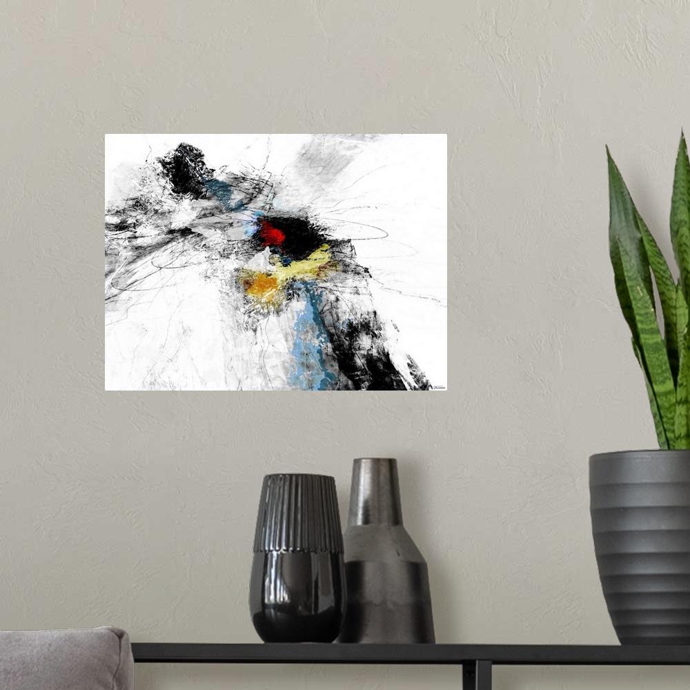 A modern room featuring Black and white abstract painting with pops of red, yellow, and blue in the middle.