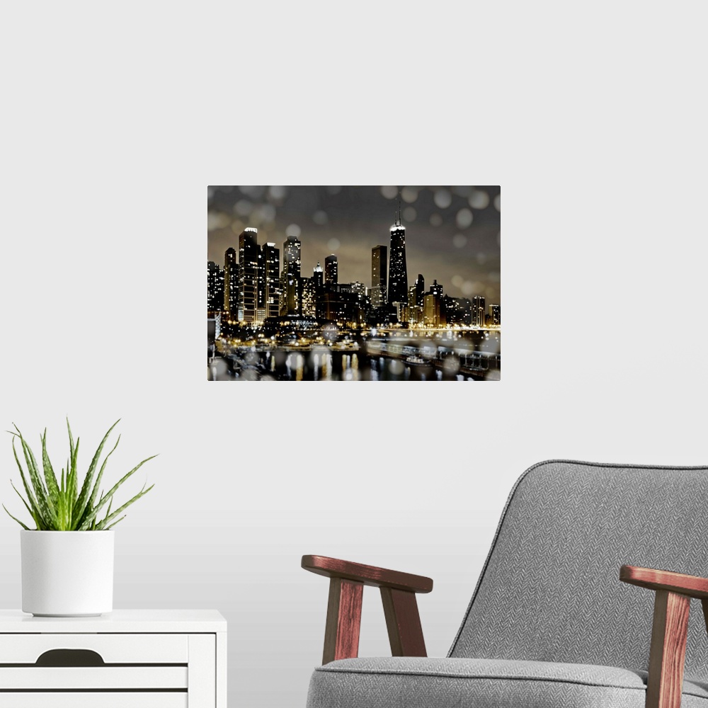 A modern room featuring The Chicago skyline lit up at night with the harbor and bokeh lights in the foreground.
