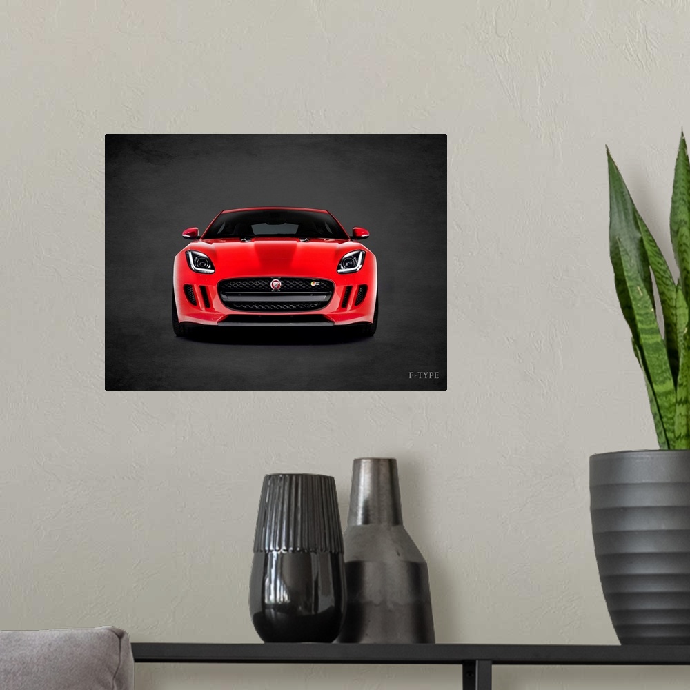 A modern room featuring Photograph of a red Jaguar F-Type  printed on a black background with a dark vignette.