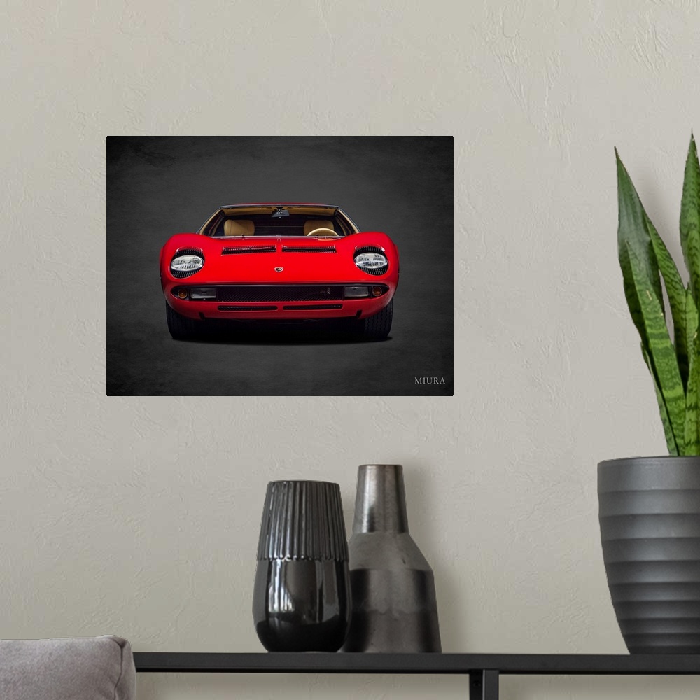 A modern room featuring Photograph of a red Lamborghini Miura printed on a black background with a dark vignette.