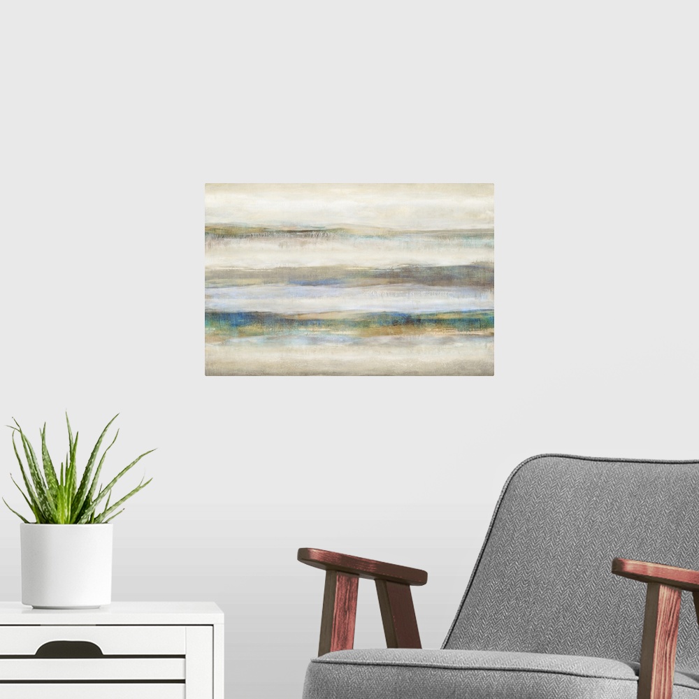 A modern room featuring Large abstract painting with neutral colors and pops of blue and gold running horizontally across...