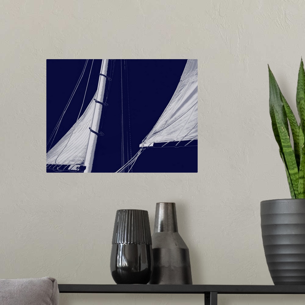 A modern room featuring Indigo and white illustration of sails from a sailboat.