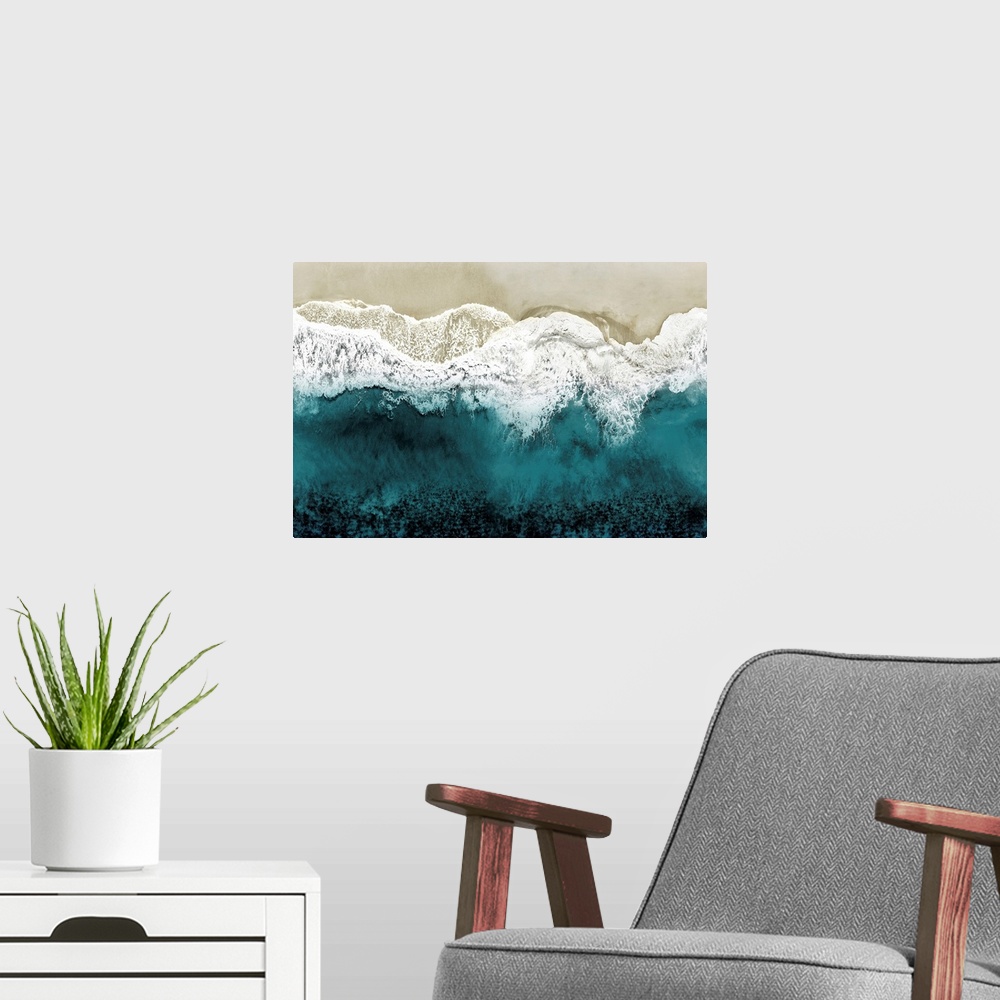 A modern room featuring One artwork in a series of aerial shots of a beach as teal waves break upon the shore.