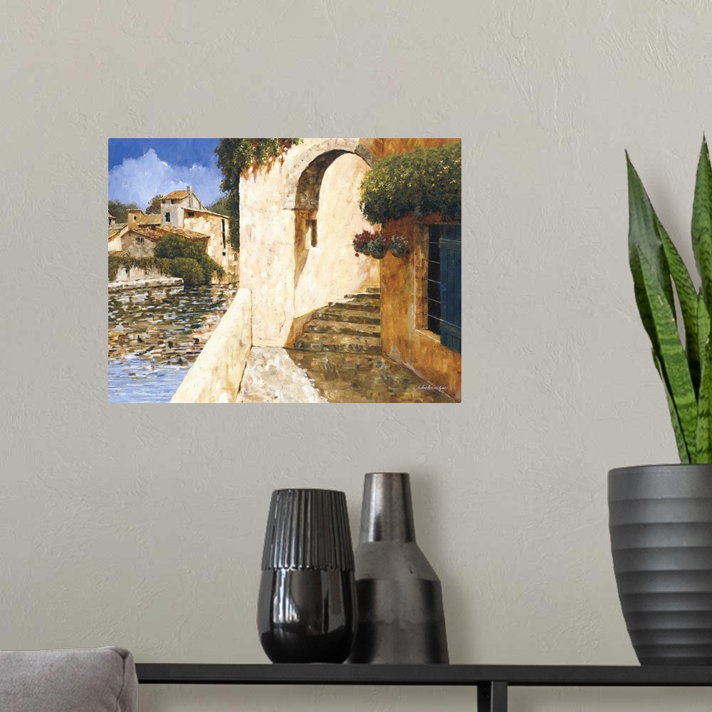 A modern room featuring Contemporary painting of an archway in a village near the water.