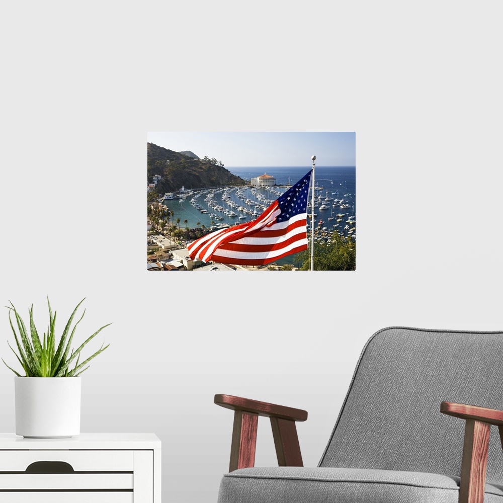 A modern room featuring USA, Catalina Island. This is the famous spot to photograph Avalon harbor. A house displays its p...
