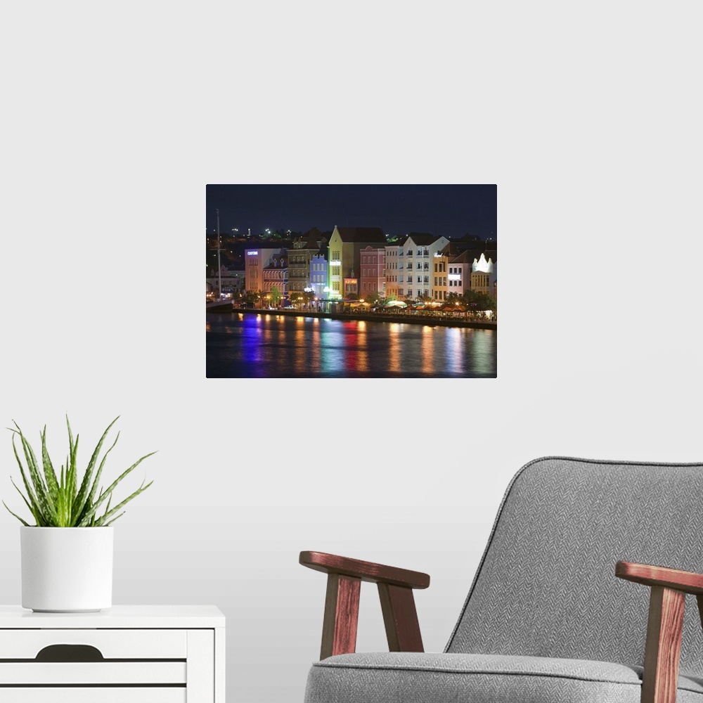 A modern room featuring ABC Islands-CURACAO-Willemstad:.Punda- Waterfront Buildings / Evening