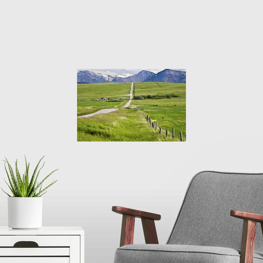 A modern room featuring North America, Canada, Alberta, Rocky Mountains south of PIncher Creek, wind turbines and wind fa...
