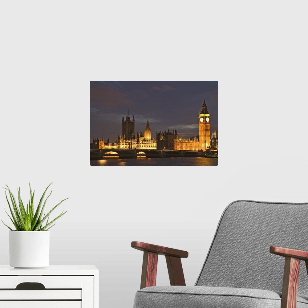 A modern room featuring Europe, Great Britain, London. Big Ben and the Houses of Parliament are illuminated at night. Cre...