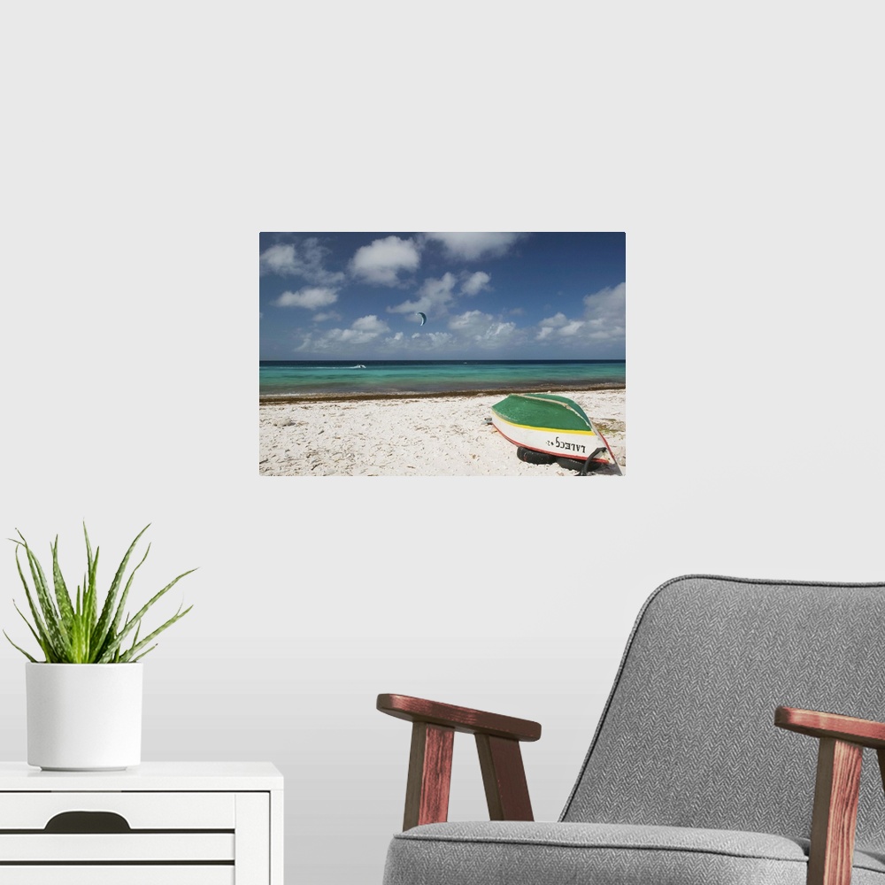 A modern room featuring ABC Islands - BONAIRE - Pink Beach: Beach View with Fishing Boat