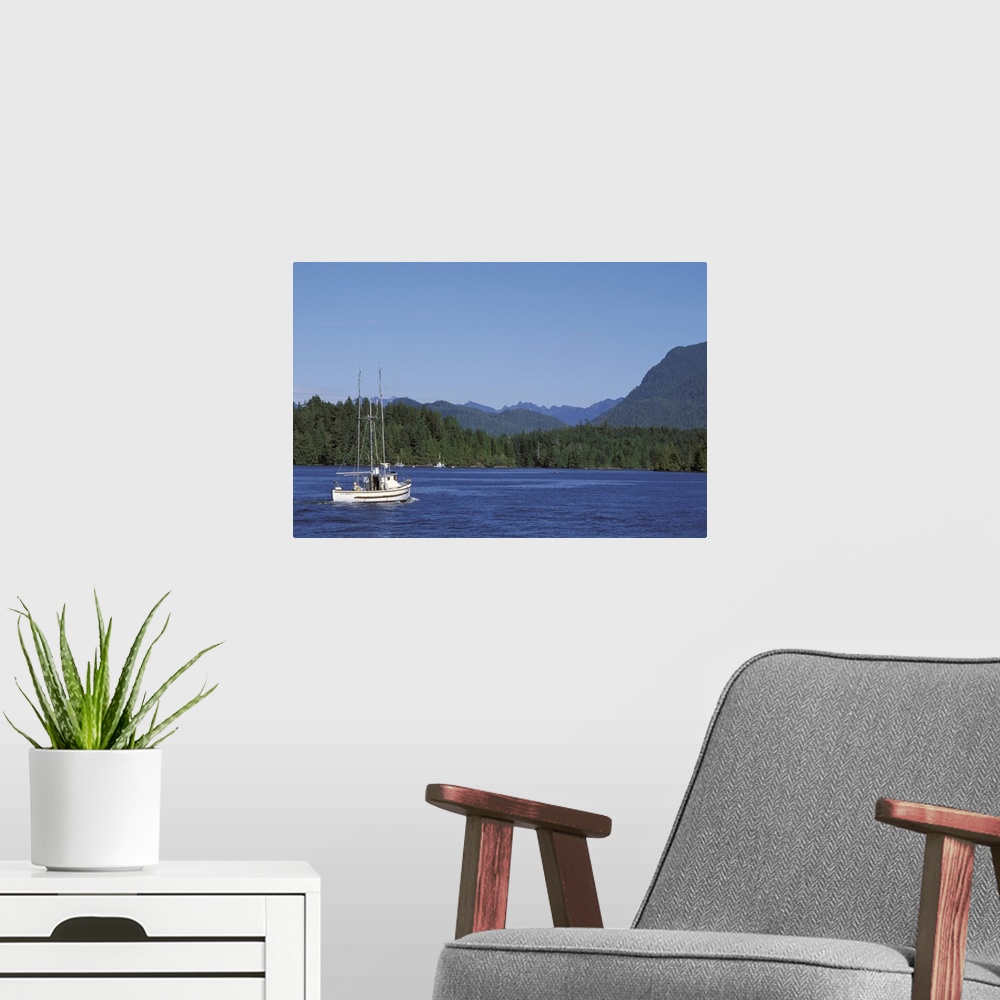 A modern room featuring Canada, British Columbia, Vancouver Island.Fishing boat from Tofino harbor into Clayoquot Sound