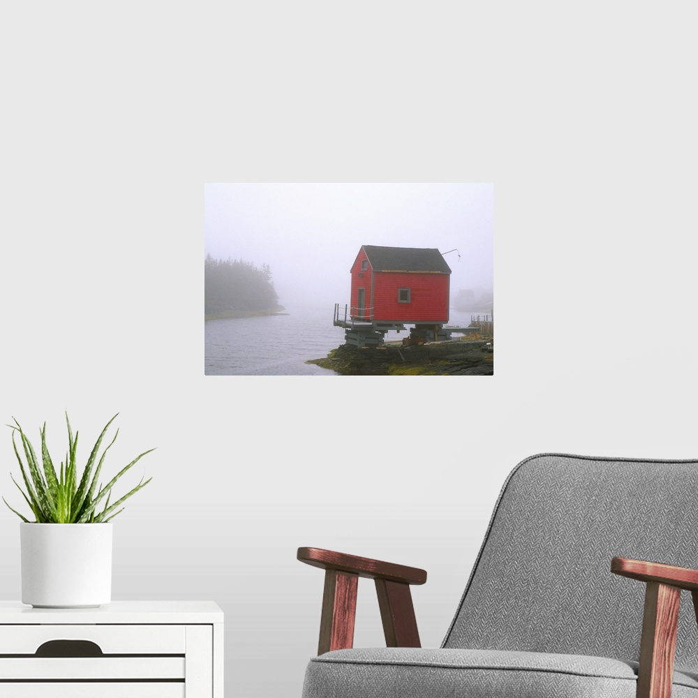 A modern room featuring N.A. Canada, Nova Scotia, Stonehurst.  Red fishing shed in fog.