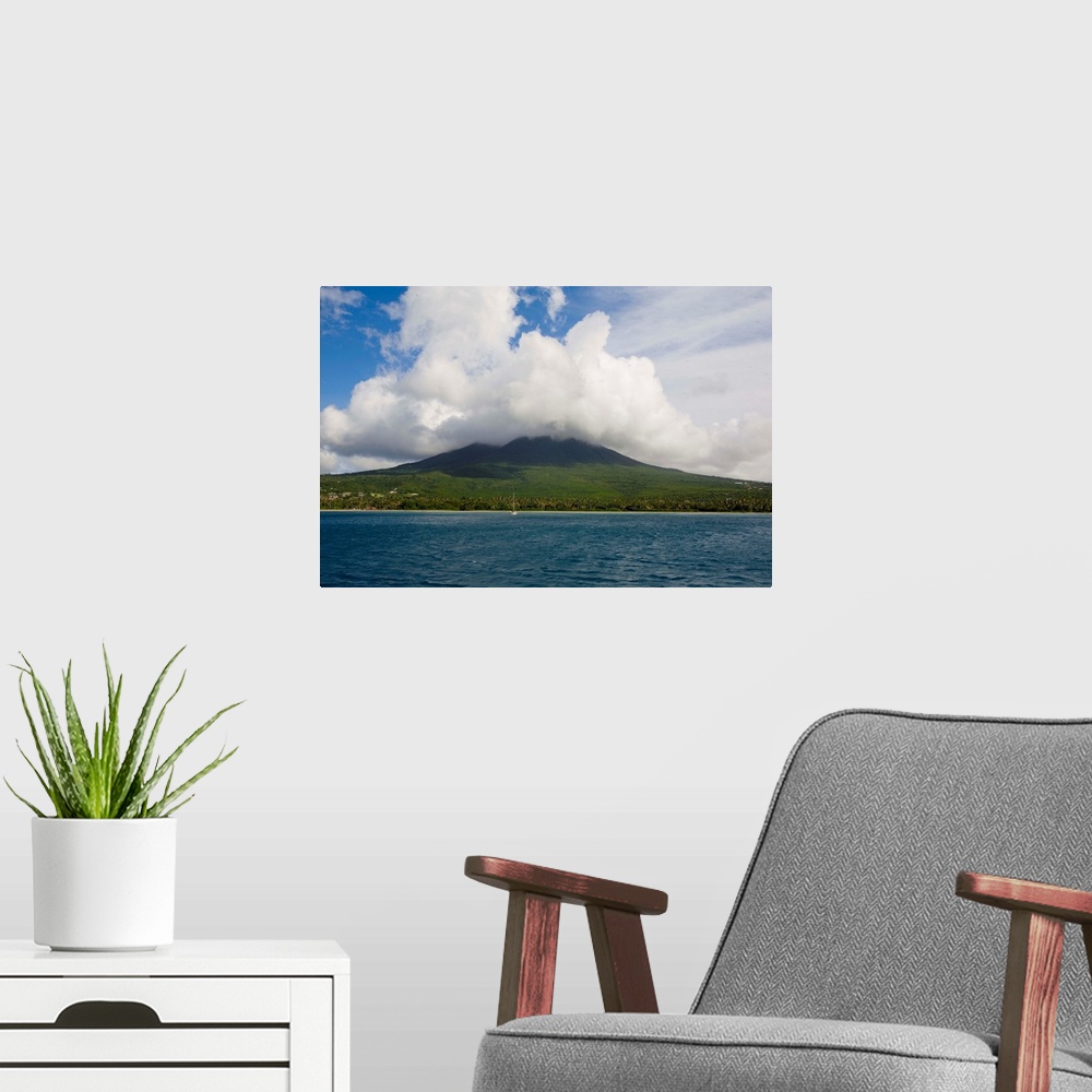 A modern room featuring Cloud covered Nevis Peak - 3,212 feet