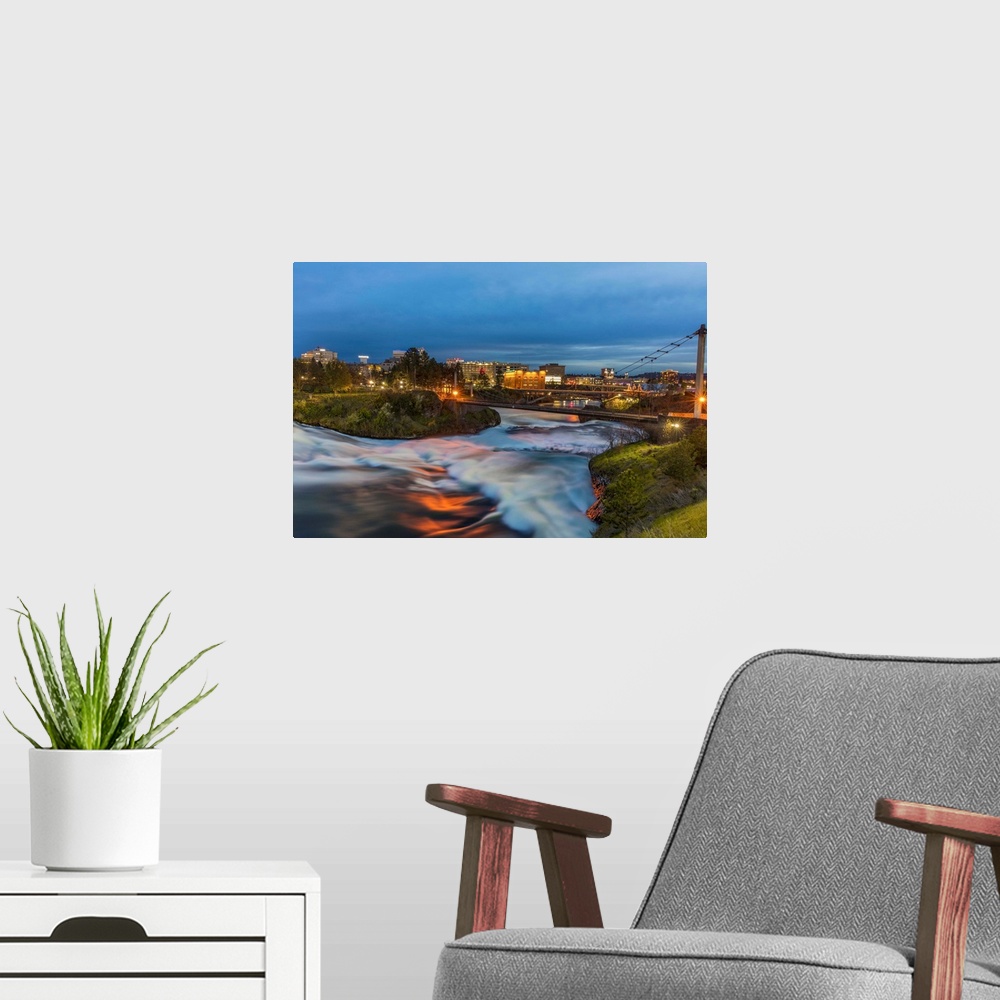 A modern room featuring Dusk descends over Spokane Falls in Spokane, Washington, USA