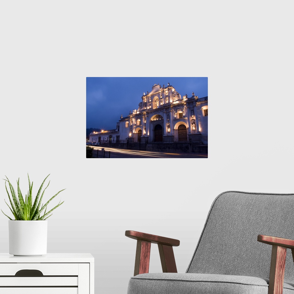 A modern room featuring Night photo of famous Cathedral de Santiago with twilight and streaks of traffic in the tourism t...