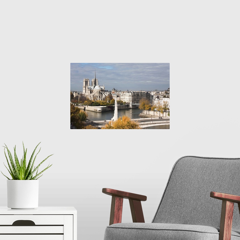 A modern room featuring France, Paris, View Of The Notre Dame And The Pont De La Tournelle Bridge