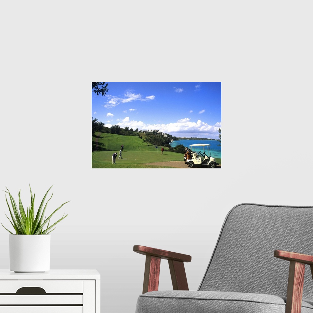 A modern room featuring Golfing at the wonderful colorful Castle Harbour Course in Bermuda vacation holiday fun with the ...