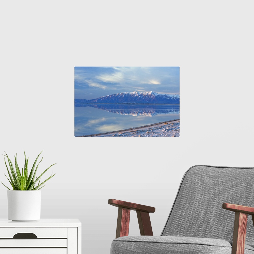 A modern room featuring View from Antelope Island Causeway at sunset of Great Salt Lake and Northern Wasatch Mountains in...