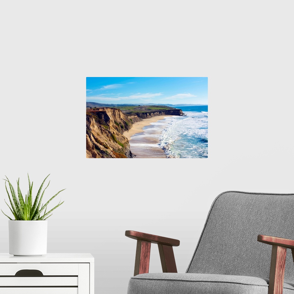 A modern room featuring Half Moon Bay California shore ocean cliffs off of the Ritz Golf Course with waves sand at Half M...