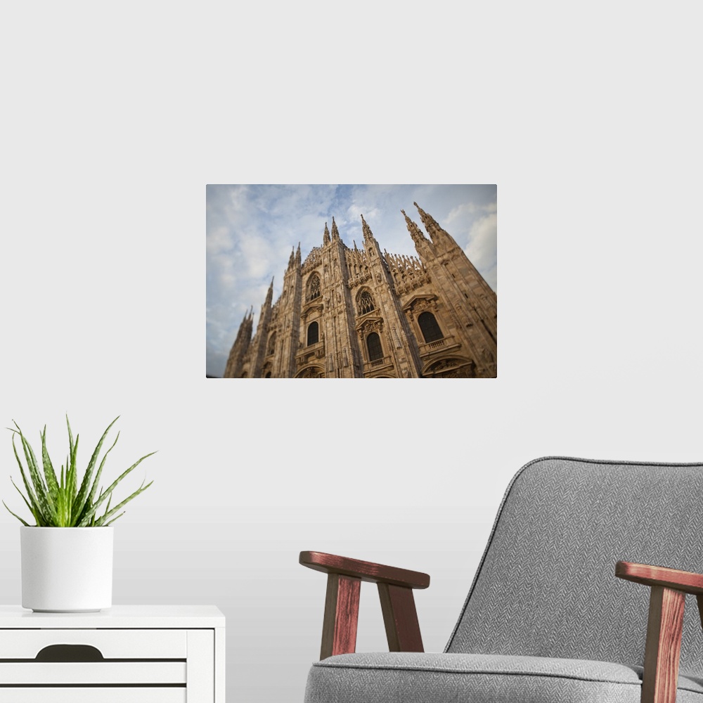 A modern room featuring ITALY, Milan Province, Milan. Milan Cathedral, evening.