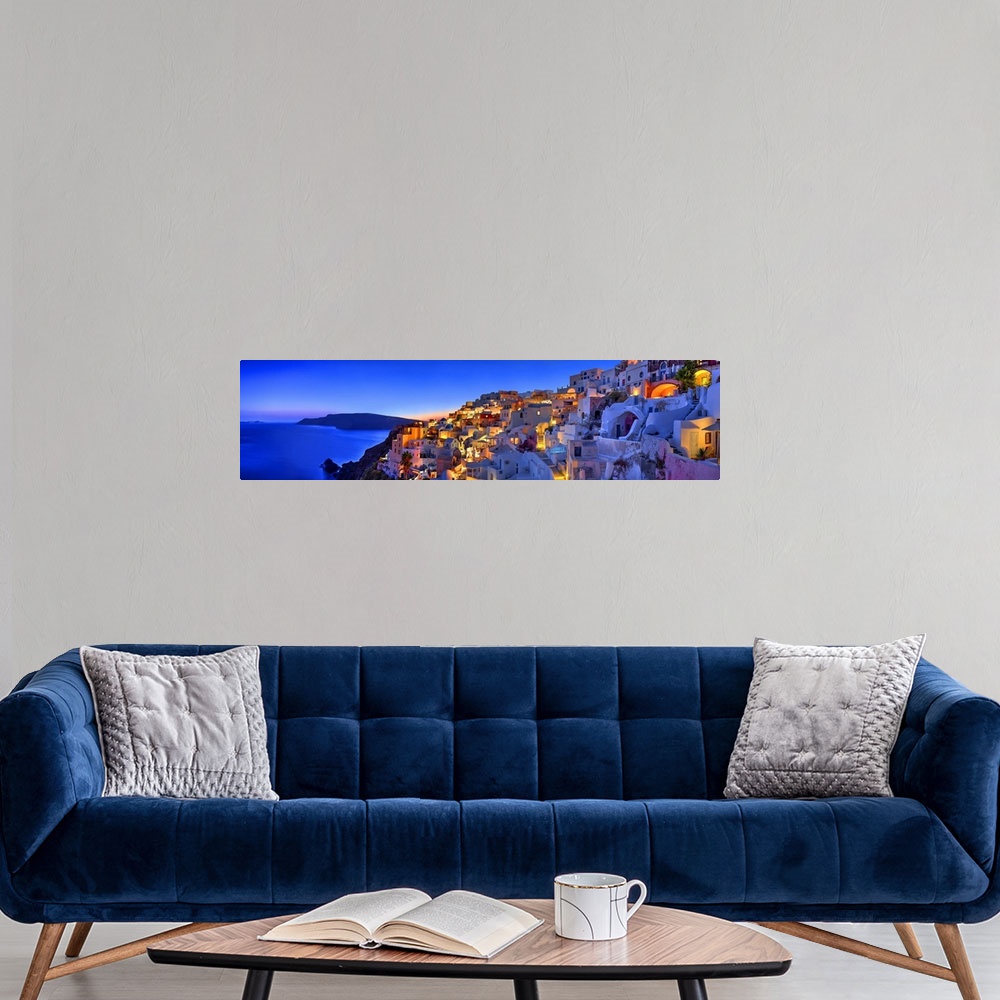 A modern room featuring Santorini, Greece on the Mediterranean sea.