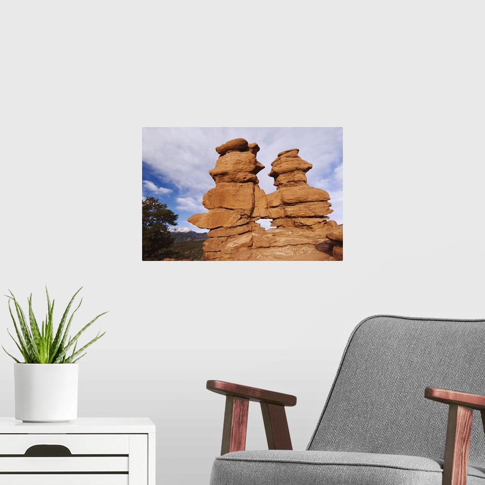 A modern room featuring Siamese Twins Rock formation and Pikes Peak, Garden of The Gods National Landmark, Colorado Sprin...