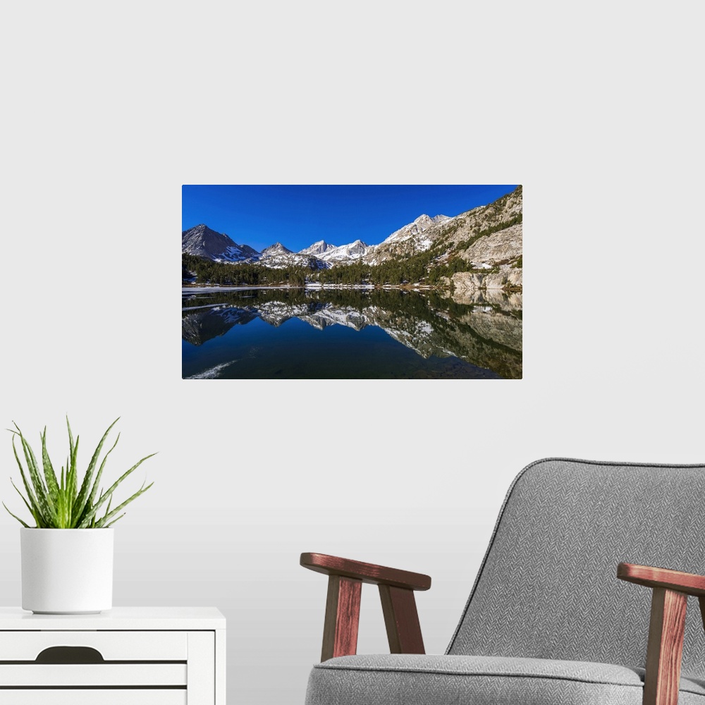 A modern room featuring Sierra peaks reflected in Long Lake, Little Lakes Valley, John Muir Wilderness, California, USA.