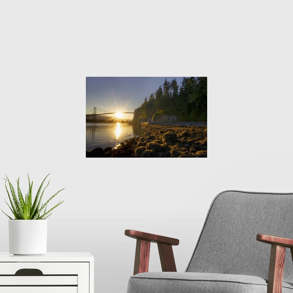 A modern room featuring Sun rising behind Lions Gate Bridge, Stanley Park, British Columbia