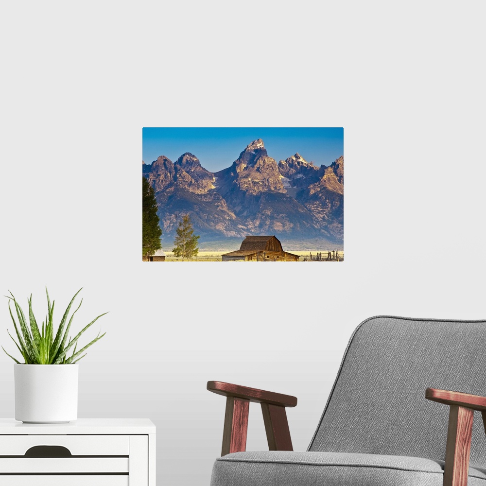A modern room featuring Teton Front Range and Mormon Barn at Sunrise, Grand Teton National Park, Wyoming.