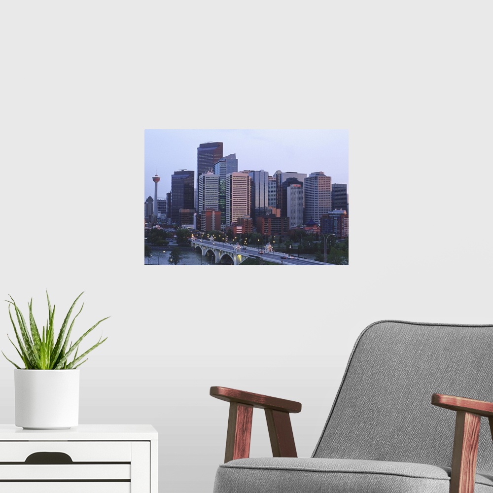 A modern room featuring The skyline of Calgary, Alberta, Canada...skyline, cityscape, highrise, skyscraper, bridge, highw...
