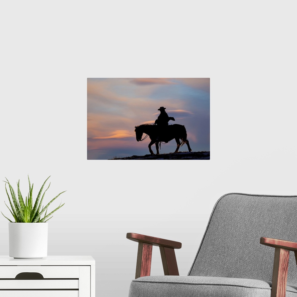 A modern room featuring USA, Shell, Wyoming, Hideout Ranch Cowgirl Silhouetted On Horseback At Sunset