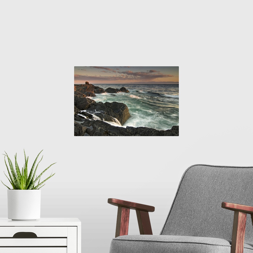 A modern room featuring USA, Washington, San Juan Islands. Waves crash on the southern shore of Lopez Island at sunset.