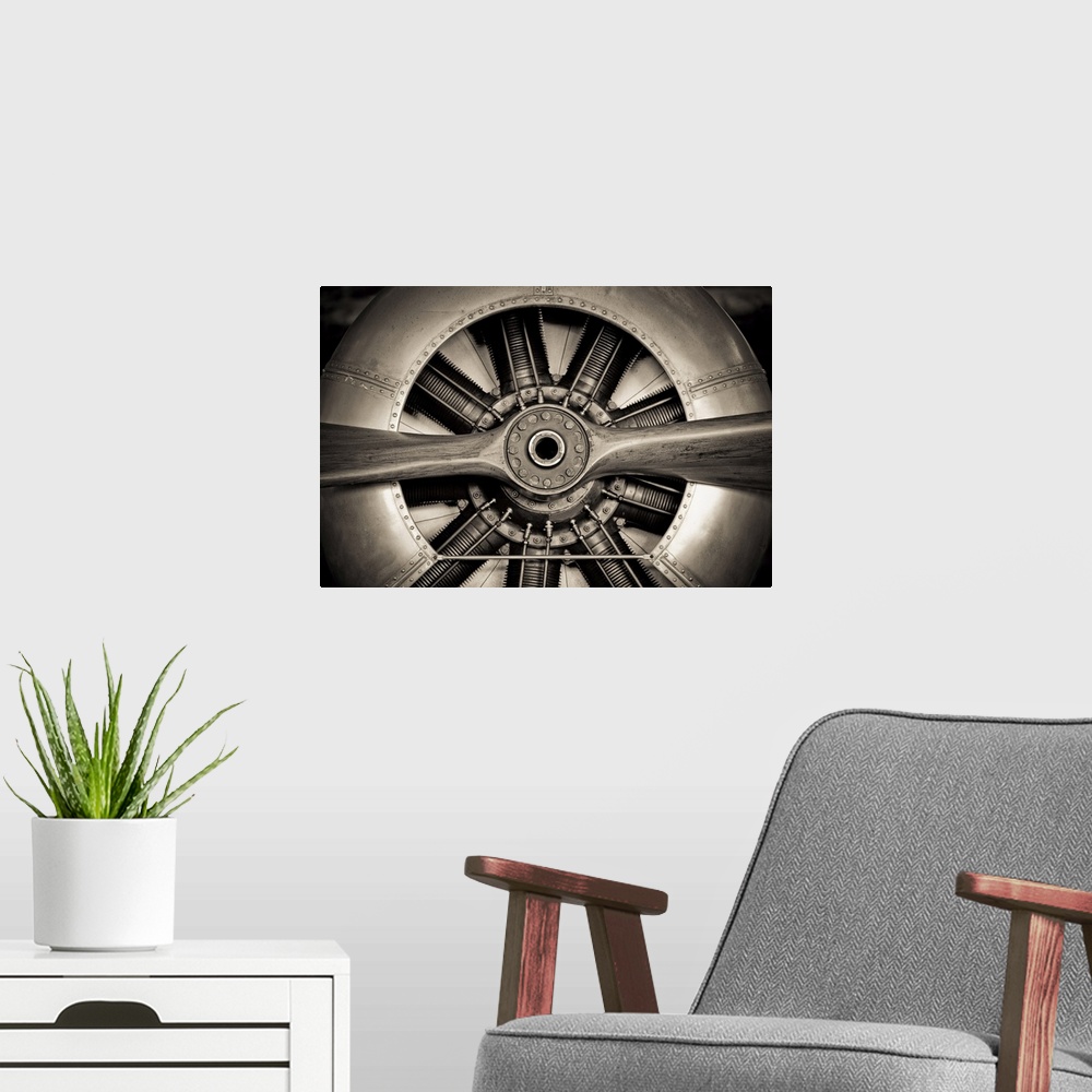A modern room featuring Vintage propeller aircraft engine engineering closeup.