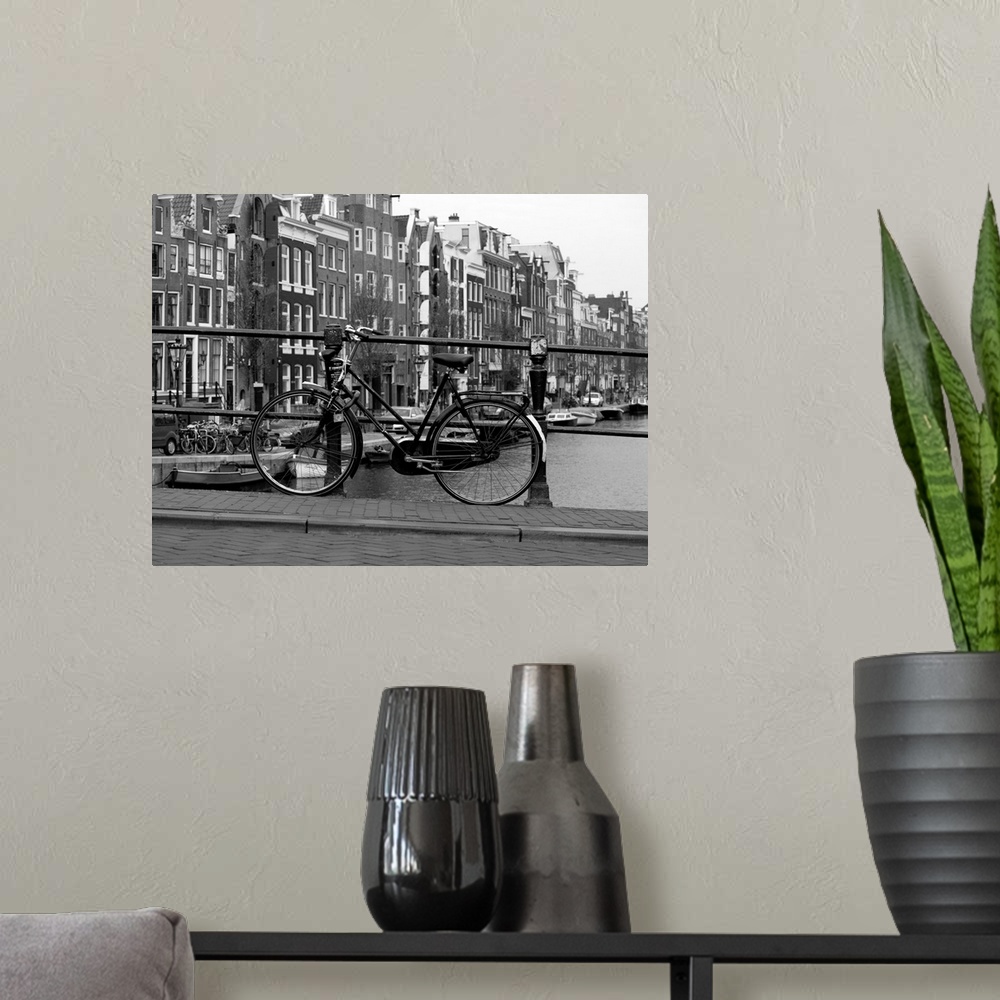 A modern room featuring Black and white view of Amsterdam.